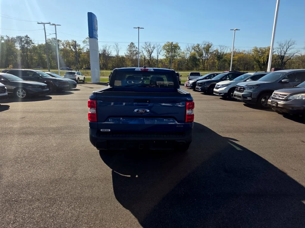 Used 2024 Blue Metallic Ford XL image 4