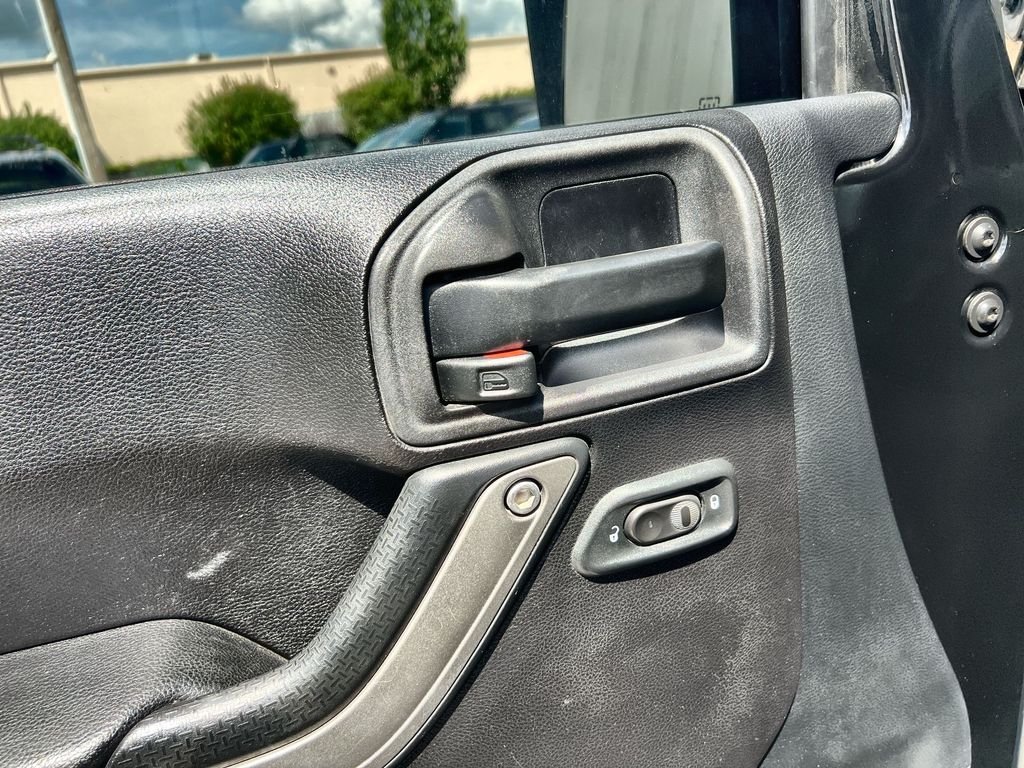 Used 2015 Black Jeep Unlimited Sport image 13