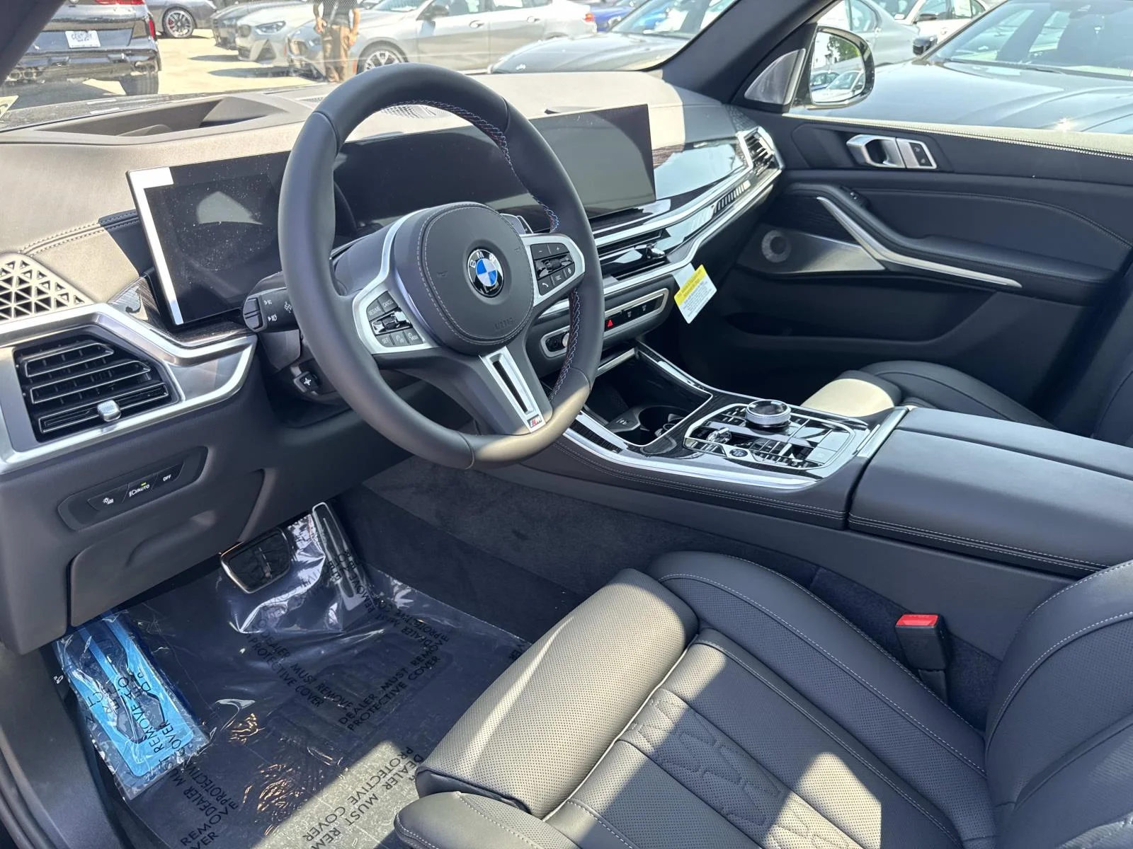 New 2026 Black Sapphire Metallic BMW M60i image 13