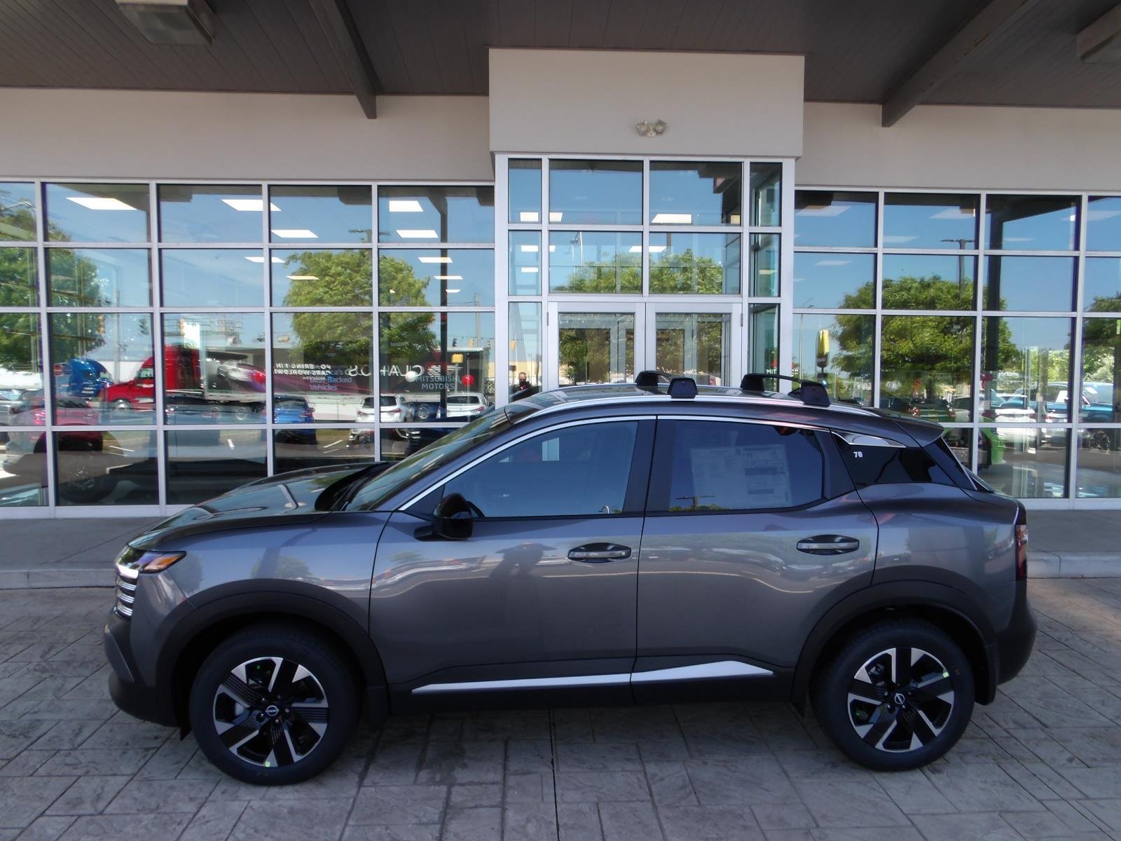 New 2026 Gun Metallic Nissan SV image 4