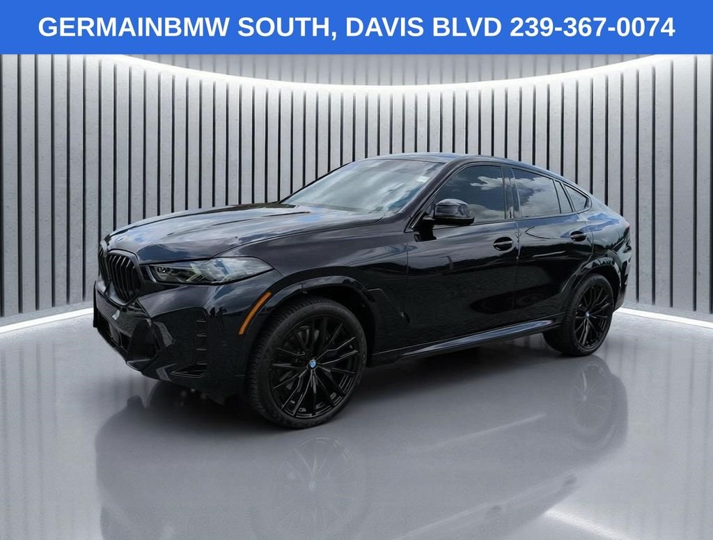 Certified Used 2026 Carbon Black Metallic BMW xDrive40i image 1