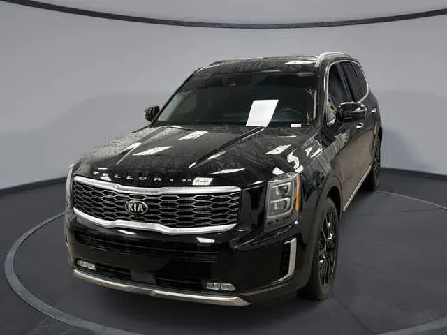 Used 2020 Ebony Black Kia SX image 1