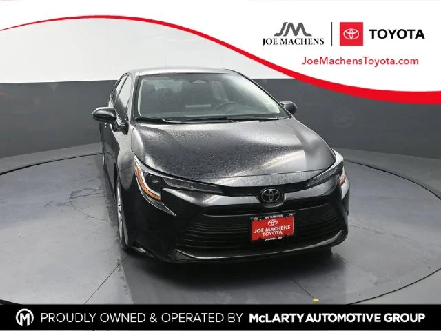 Used 2024 Black Toyota LE image 1