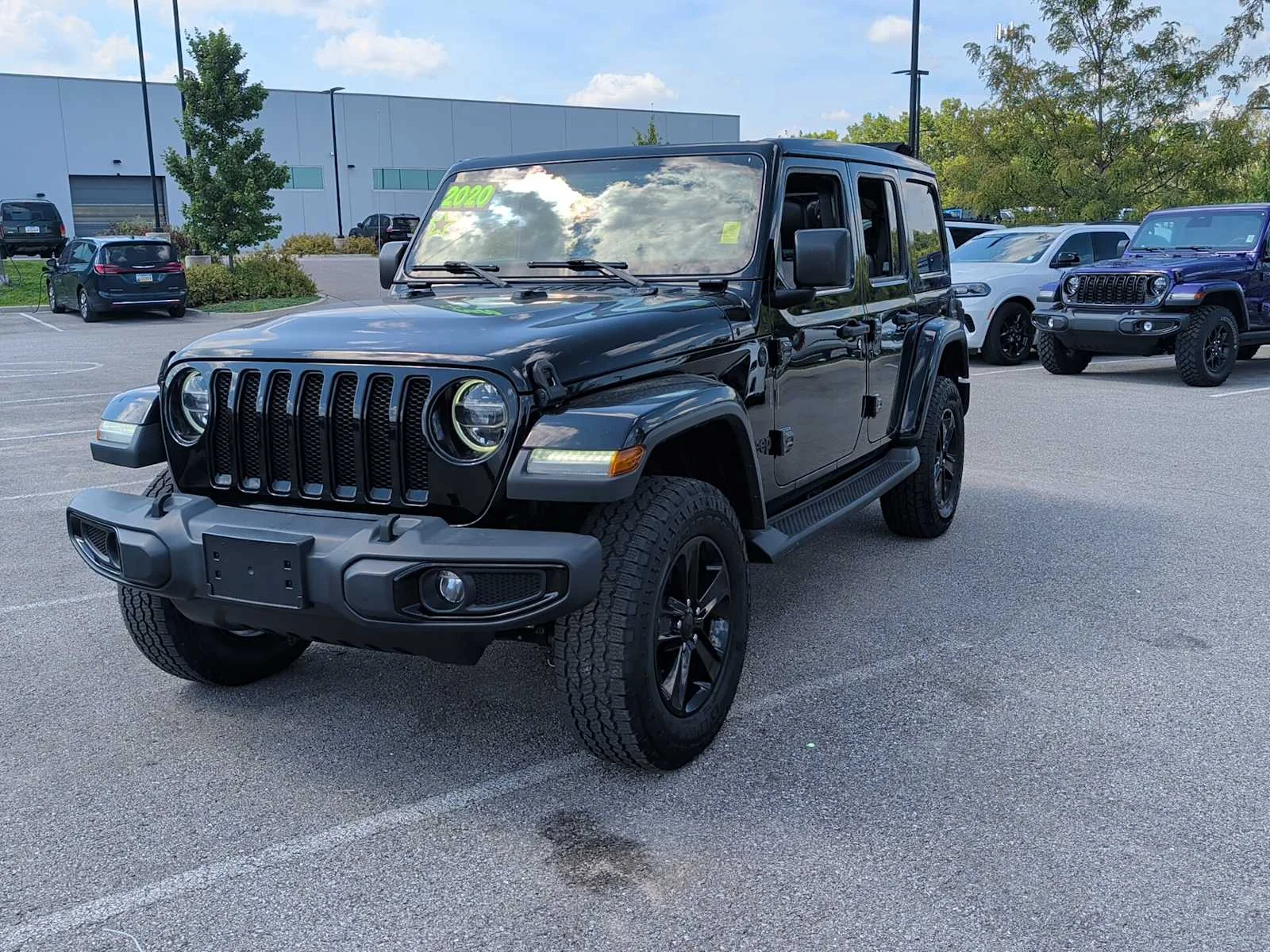 Used 2020 Jeep Wrangler Unlimited Sahara Altitude with VIN 1C4HJXEM7LW323306 for sale in Kansas City