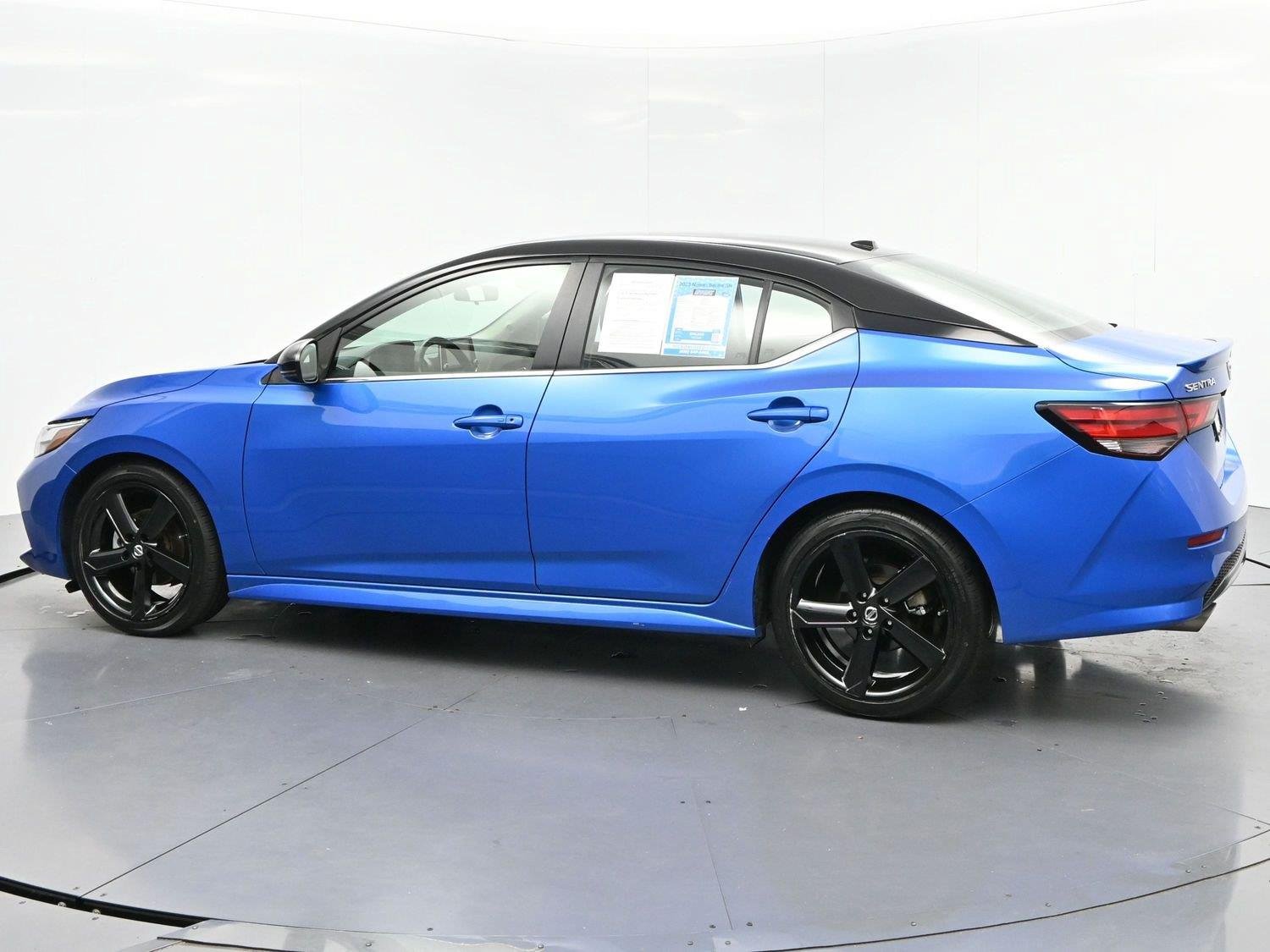 Used 2023 Electric Blue Metallic/Super Black Nissan SR image 5