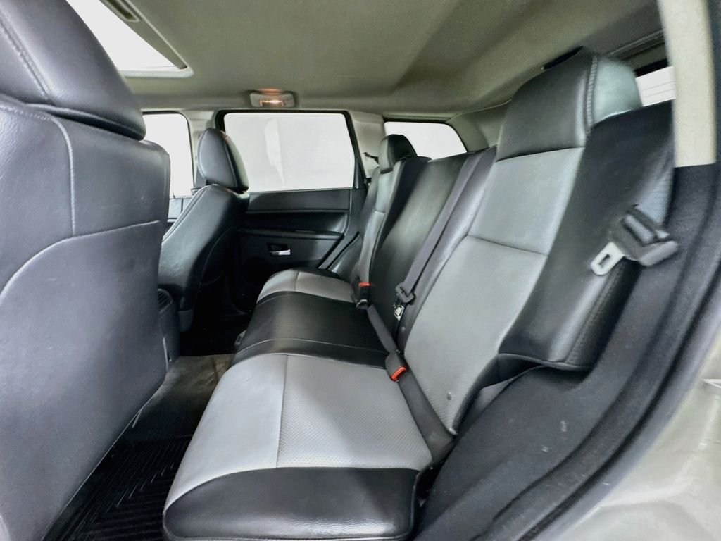 Used 2010 Light Graystone Pearlcoat Jeep Laredo image 29
