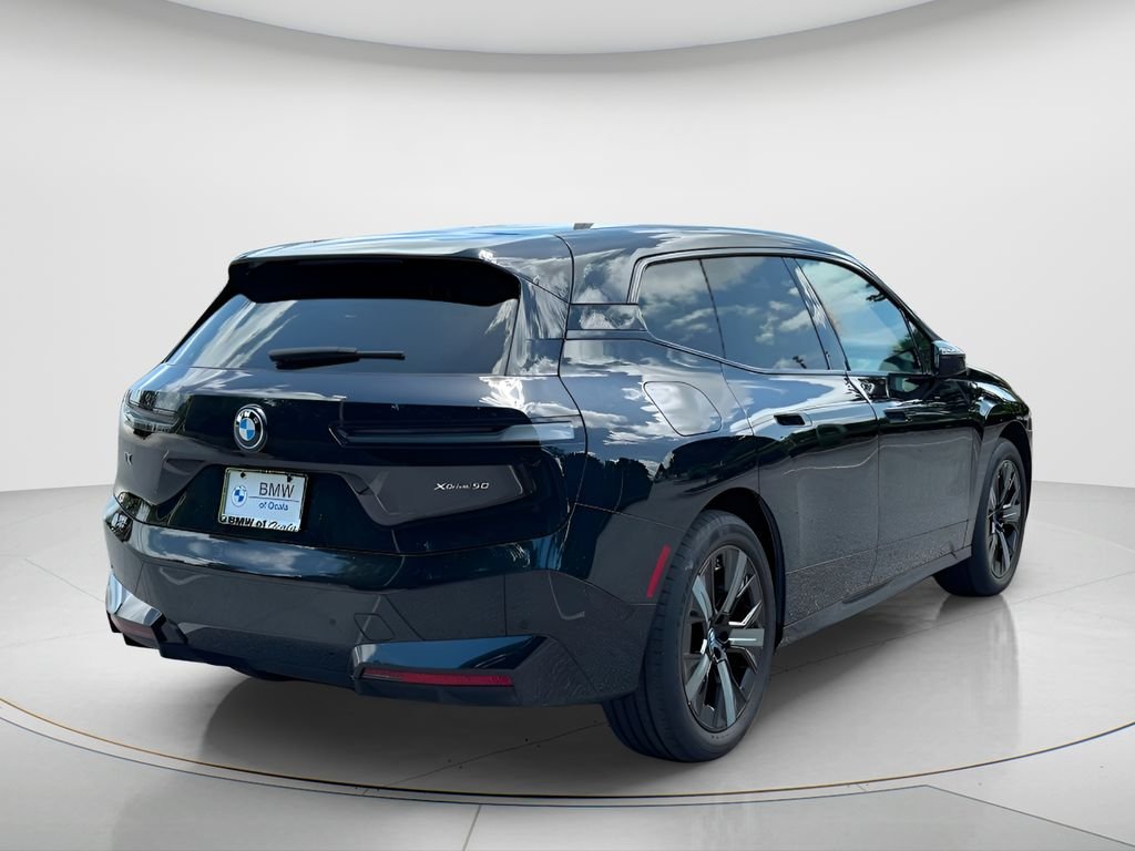 Used 2024 Black BMW xDrive50 image 5