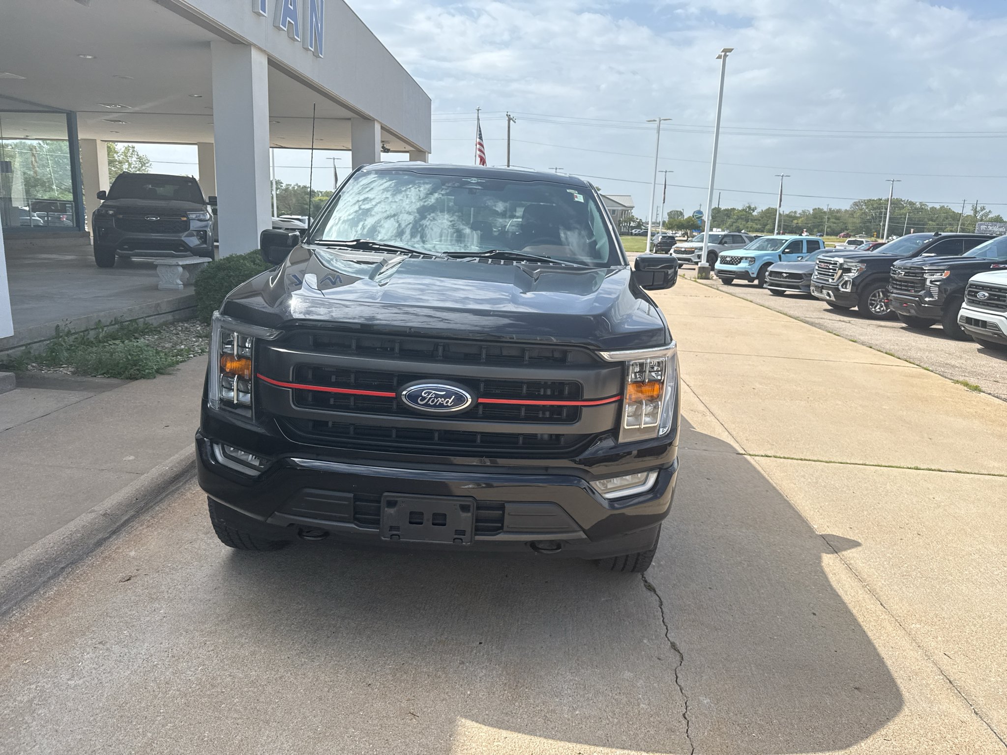 Used 2023 Agate Black Metallic Ford LARIAT image 2