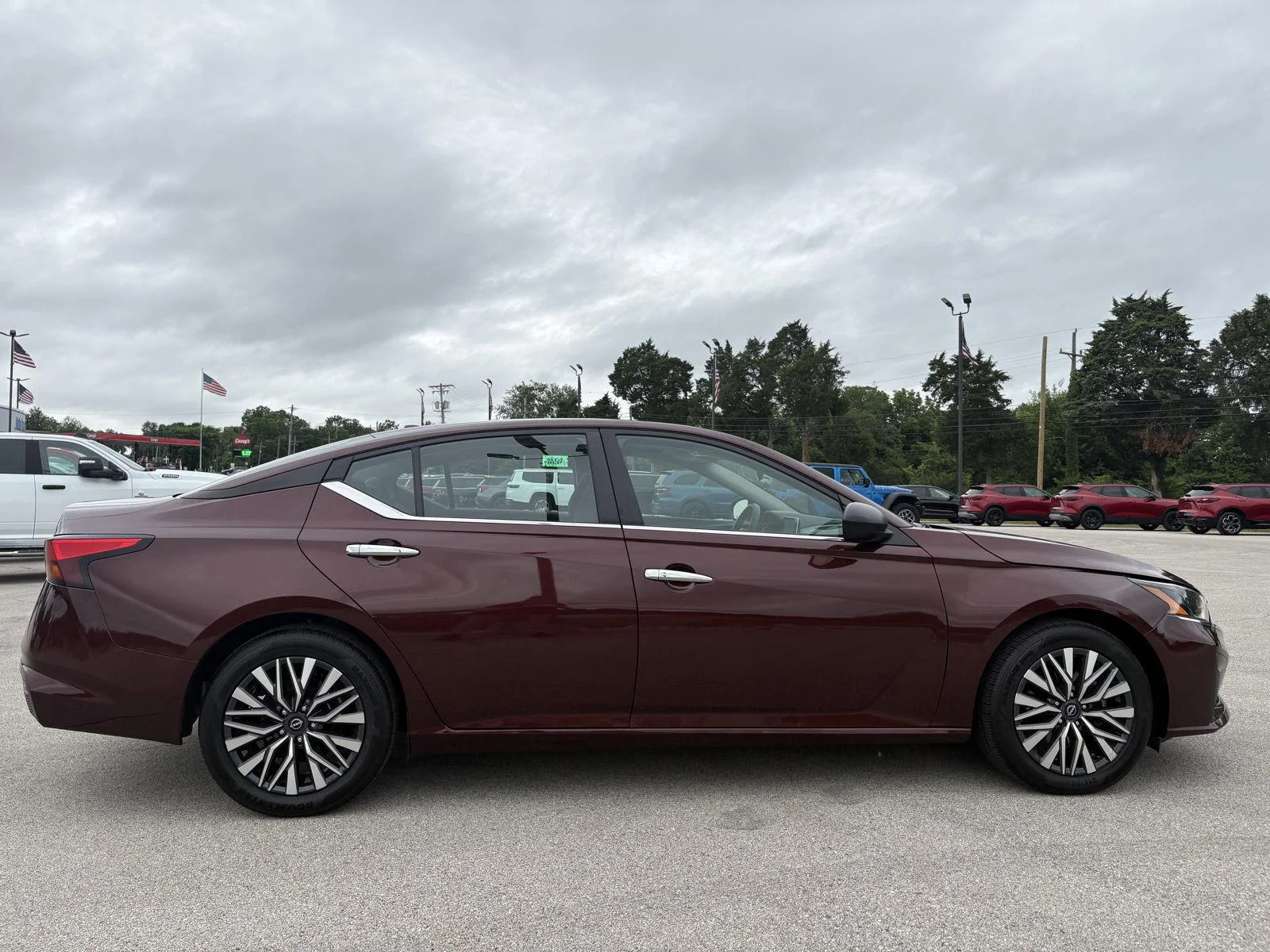 Used 2025 Garnet Pearl Metallic Nissan SV image 4