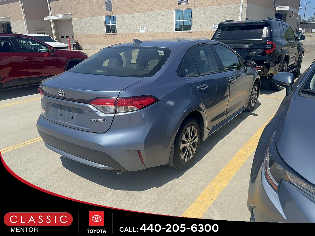 Used 2021 Celestite Gray Metallic Toyota LE 4dr Sedan image 3