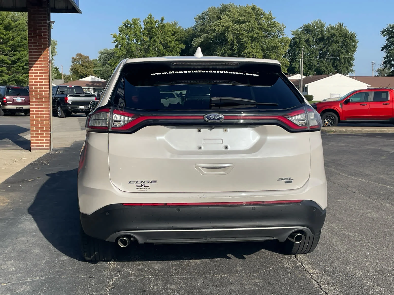 Used 2015 White Platinum Metallic Tri-Coat Ford SEL image 4