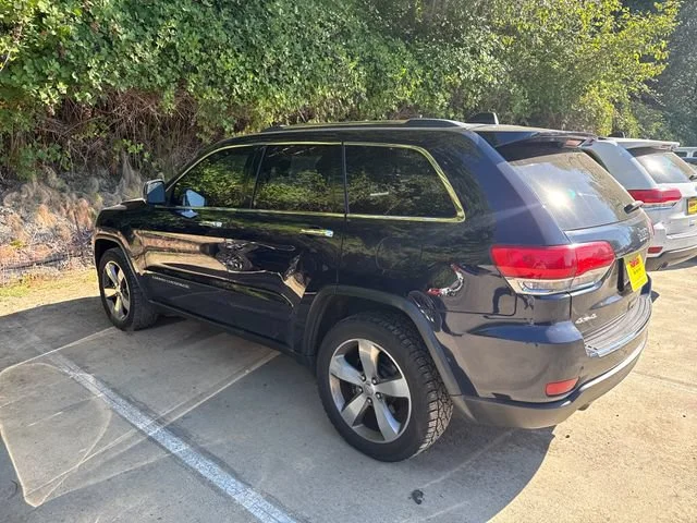 Used 2014 True Blue Pearlcoat Jeep Limited image 4