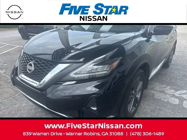 Used 2024 Black Nissan Platinum image 1