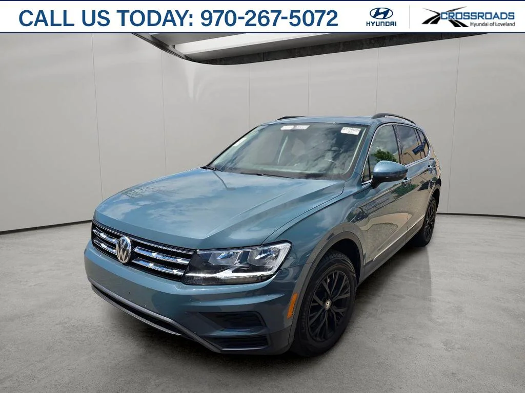 Used 2020 Stone Blue Metallic Volkswagen SE image 1