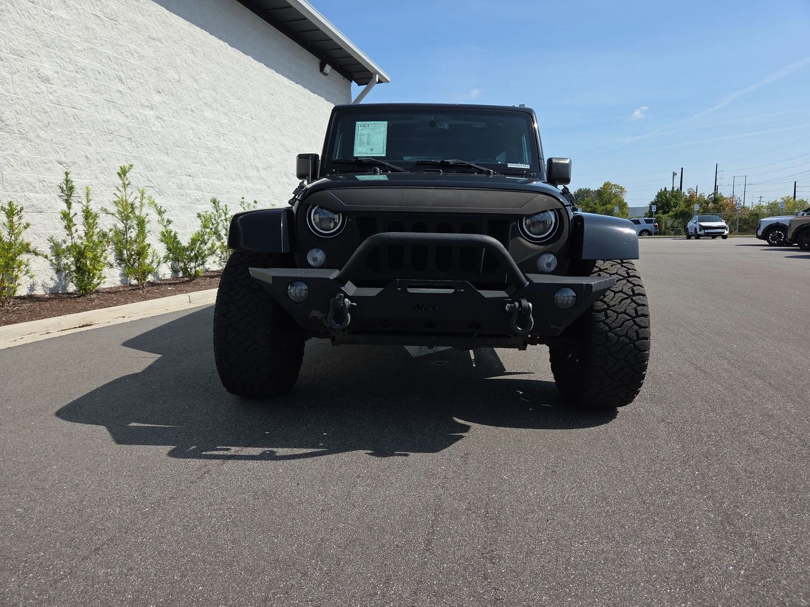 Used 2016 Black Clearcoat Jeep Unlimited Sahara image 5