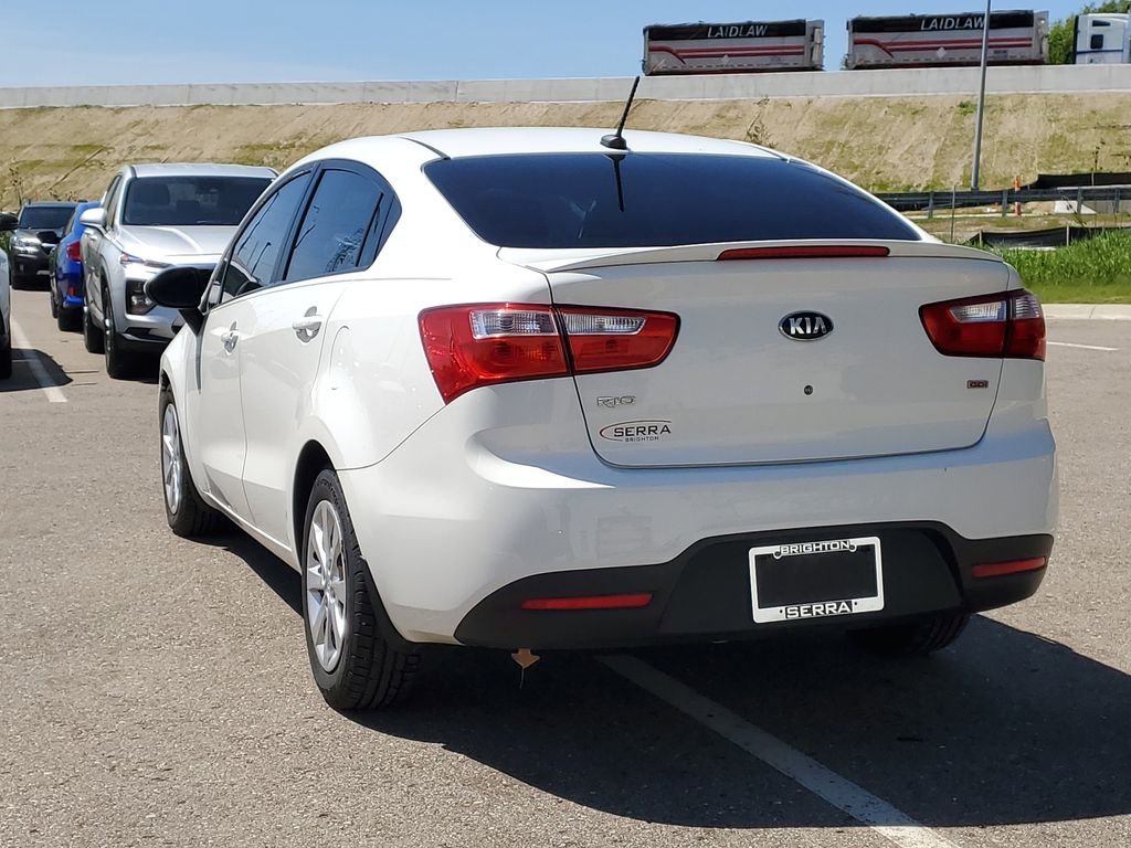Used 2014 Kia Rio LX with VIN KNADM4A39E6372346 for sale in Brighton, MI