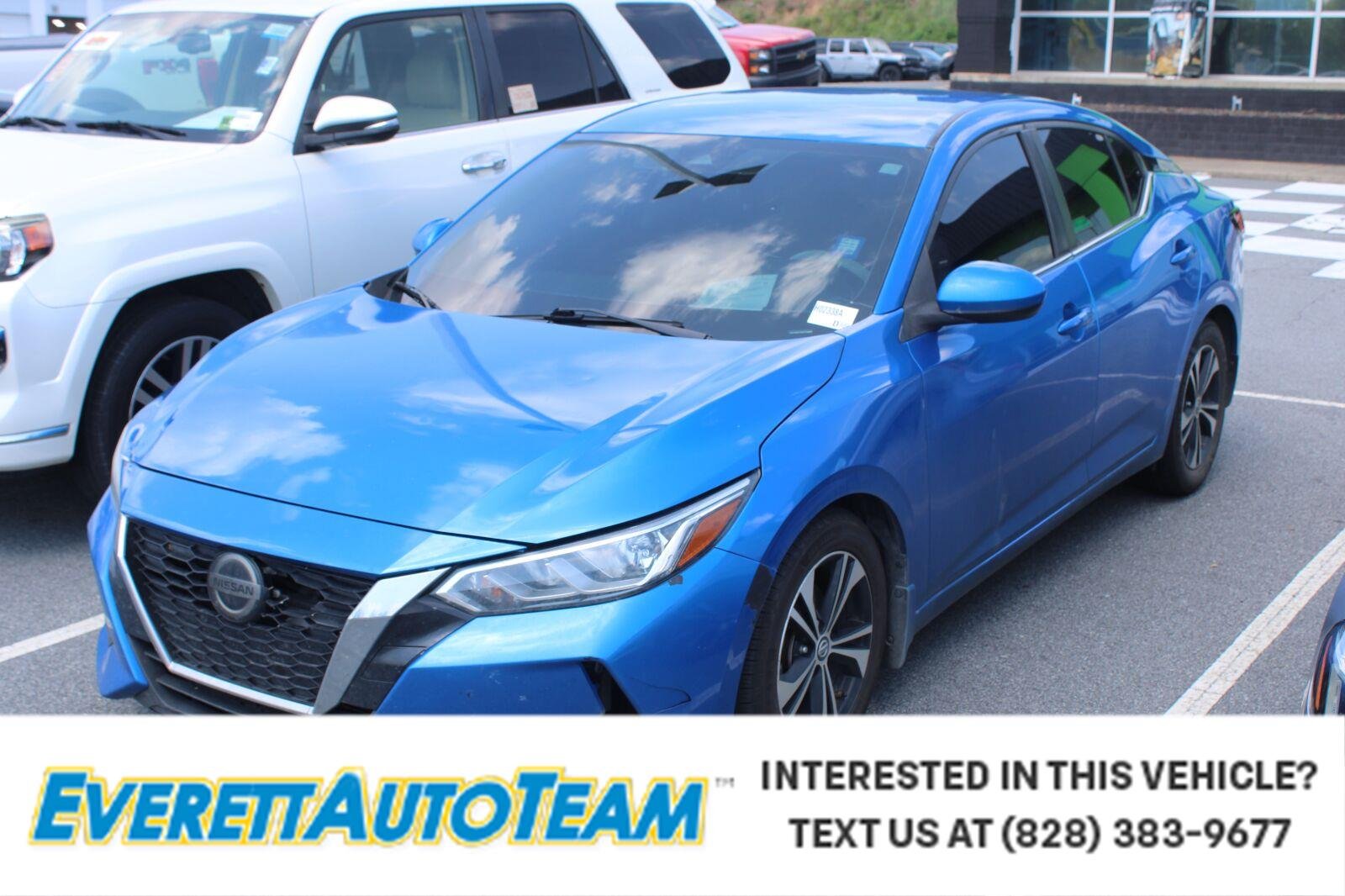 Used 2021 Electric Blue Metallic Nissan SV image 1