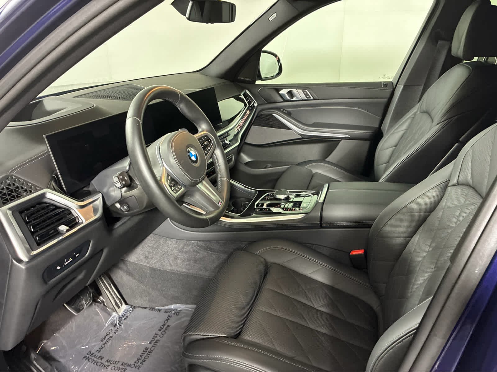Used 2026 Tanzanite Blue II Metallic BMW xDrive40i image 7