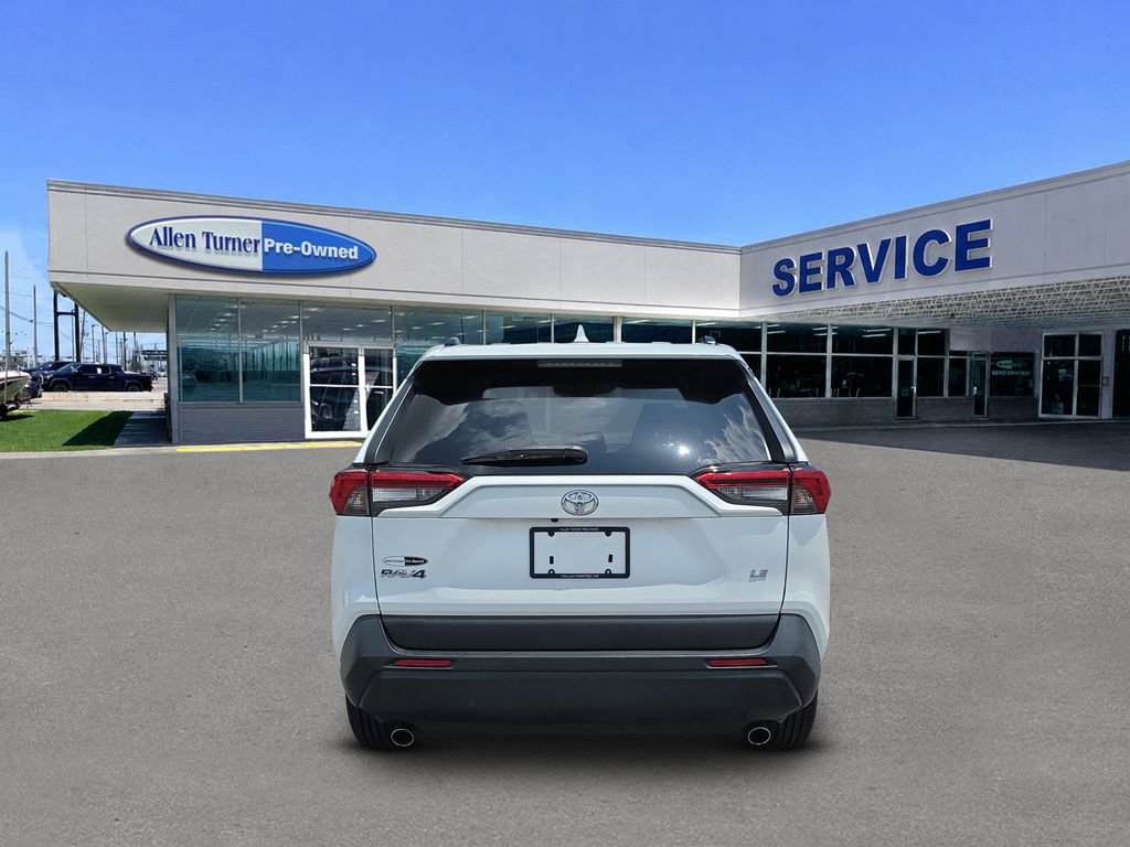 Used 2021 Super White Toyota LE image 7