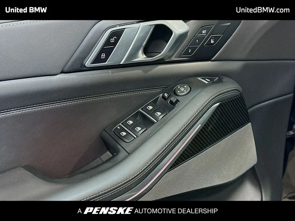 Certified Used 2026 Black Sapphire Metallic BMW M60i image 3