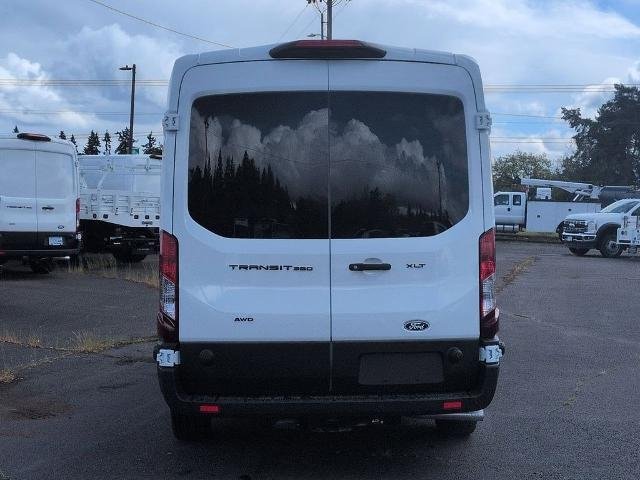 New 2026 Oxford White Ford Passenger Van XLT image 4