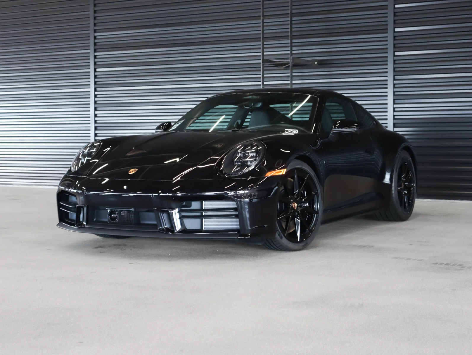 New 2026 Jet Black Metallic Porsche Carrera 4S Coupe image 1