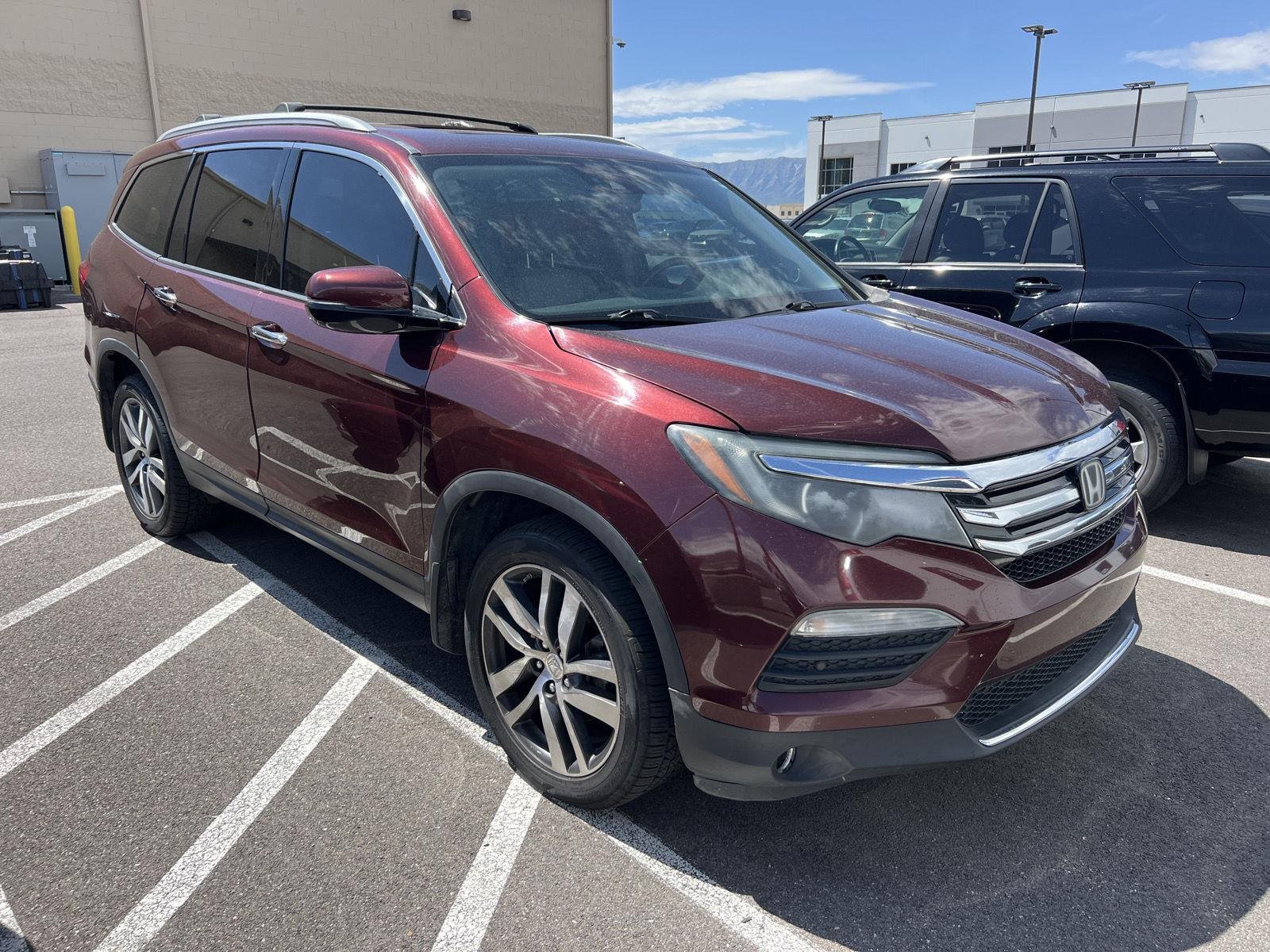 Used 2018 Deep Scarlet Pearl Honda Elite image 2