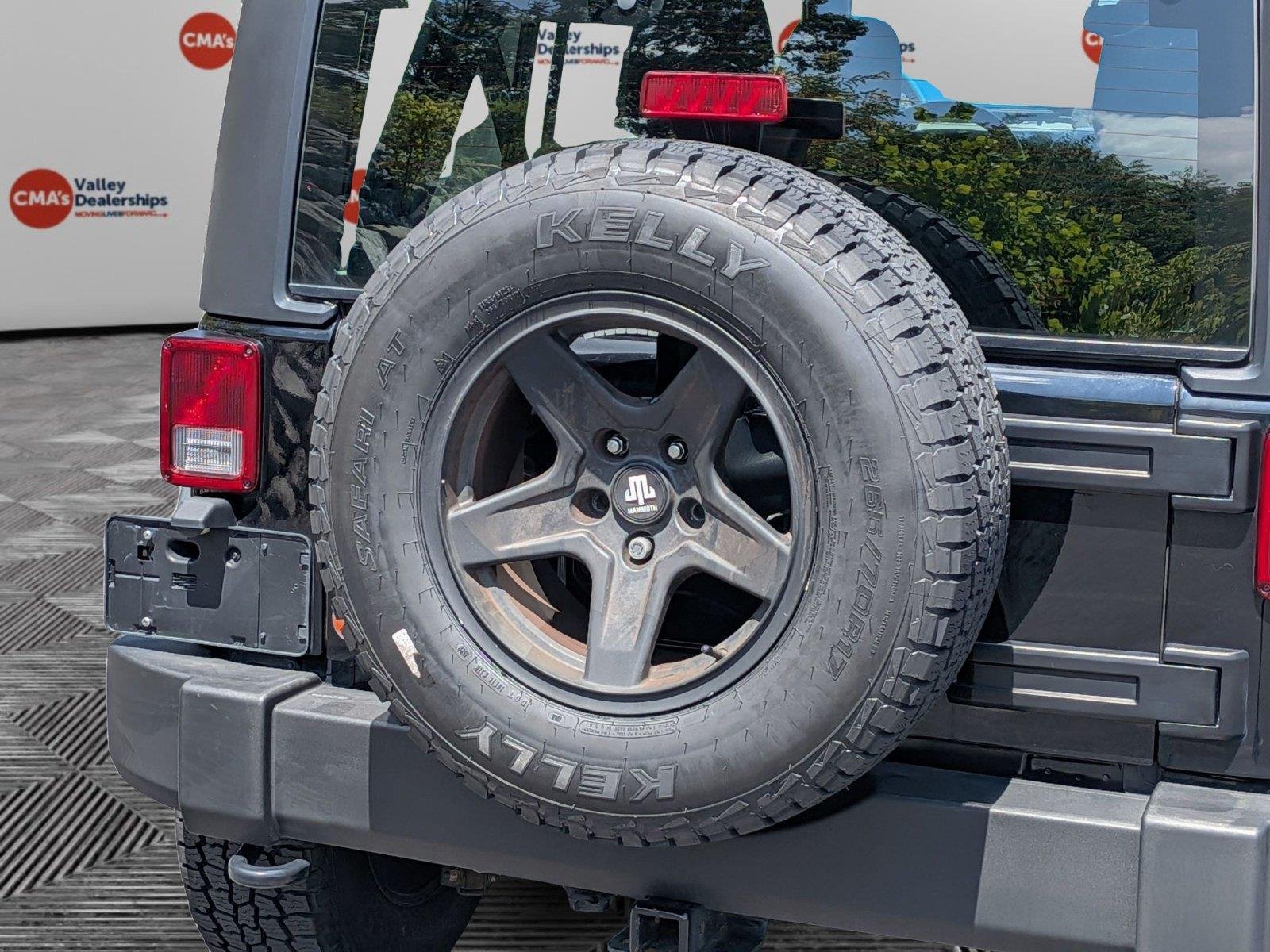 Used 2016 Black Clearcoat Jeep Sport image 9
