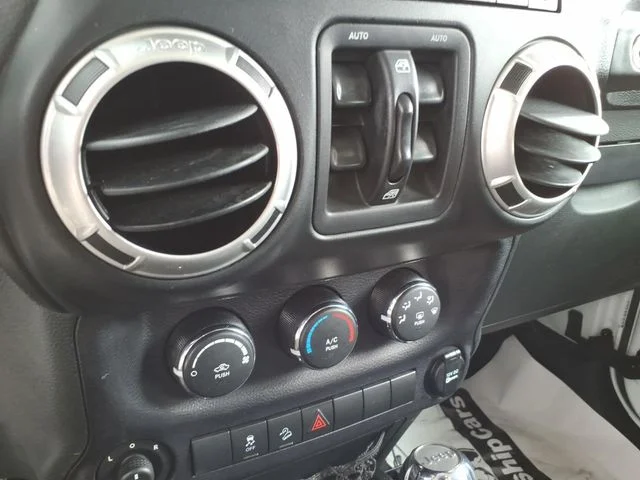 Used 2015 White Jeep Unlimited Sport image 26