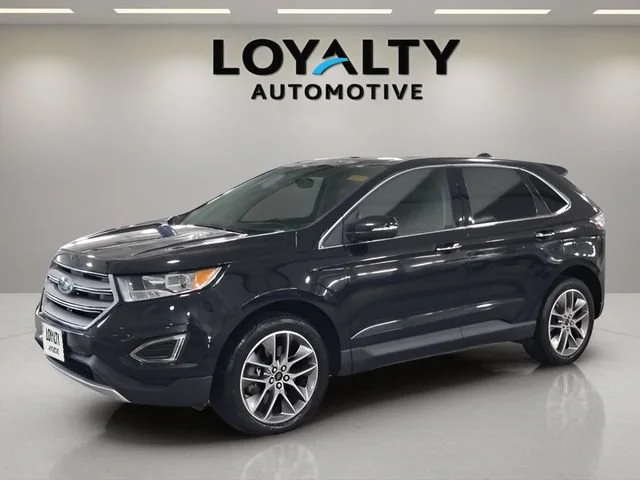 Used 2015 Black Ford Titanium image 1