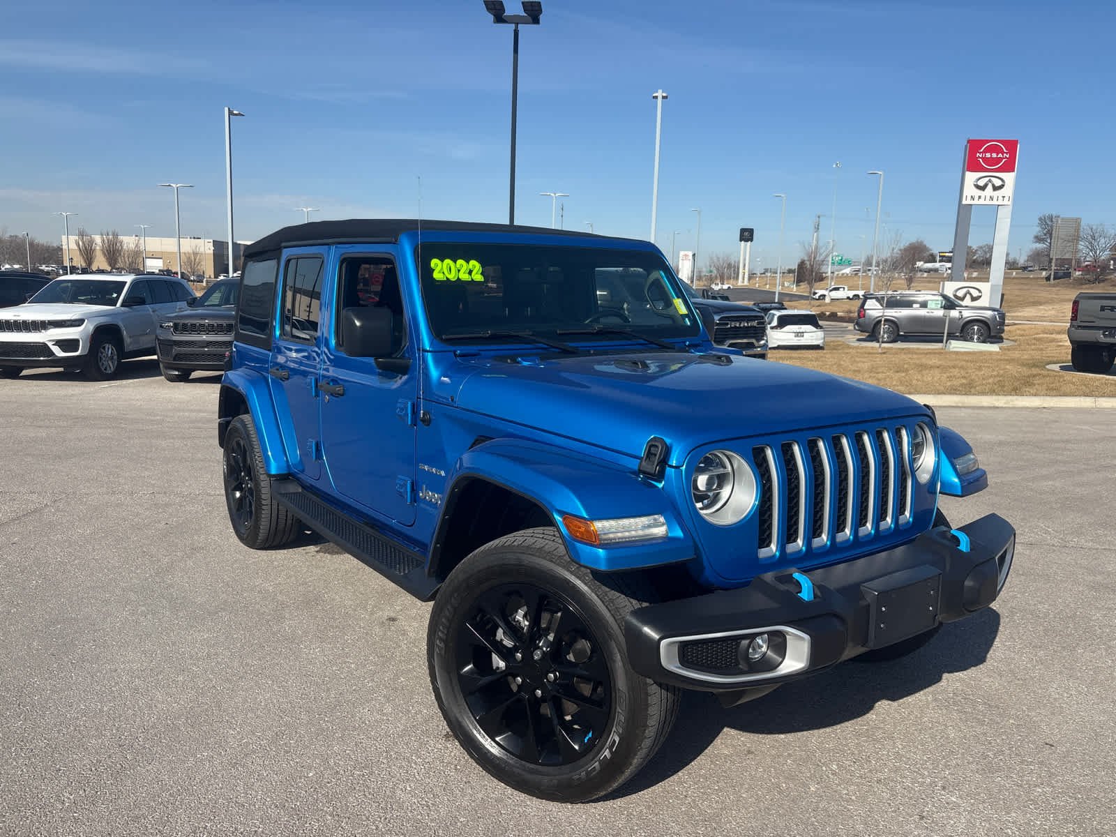 Used 2022 Jeep Wrangler Unlimited Sahara 4XE with VIN 1C4JJXP63NW279372 for sale in Kansas City