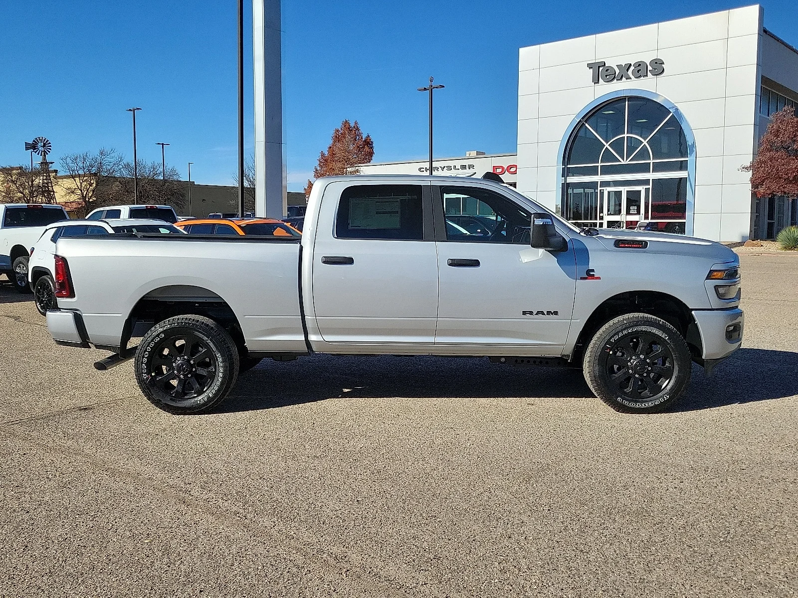 New 2026 Silver Zynith Ram LONE STAR CREW CAB 4X4 6
