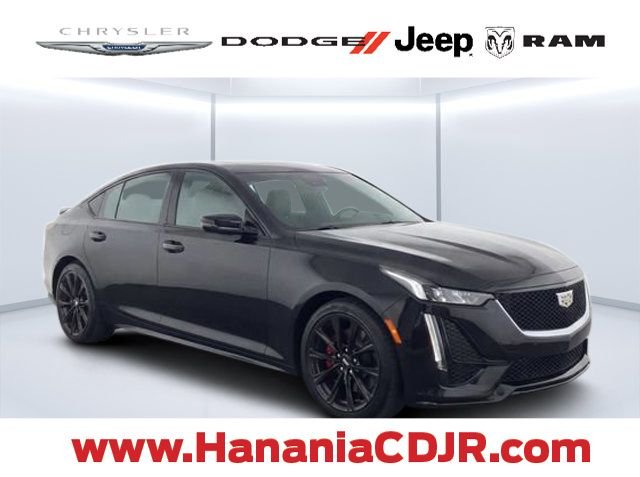 Used 2023 Black Cadillac Sport image 1