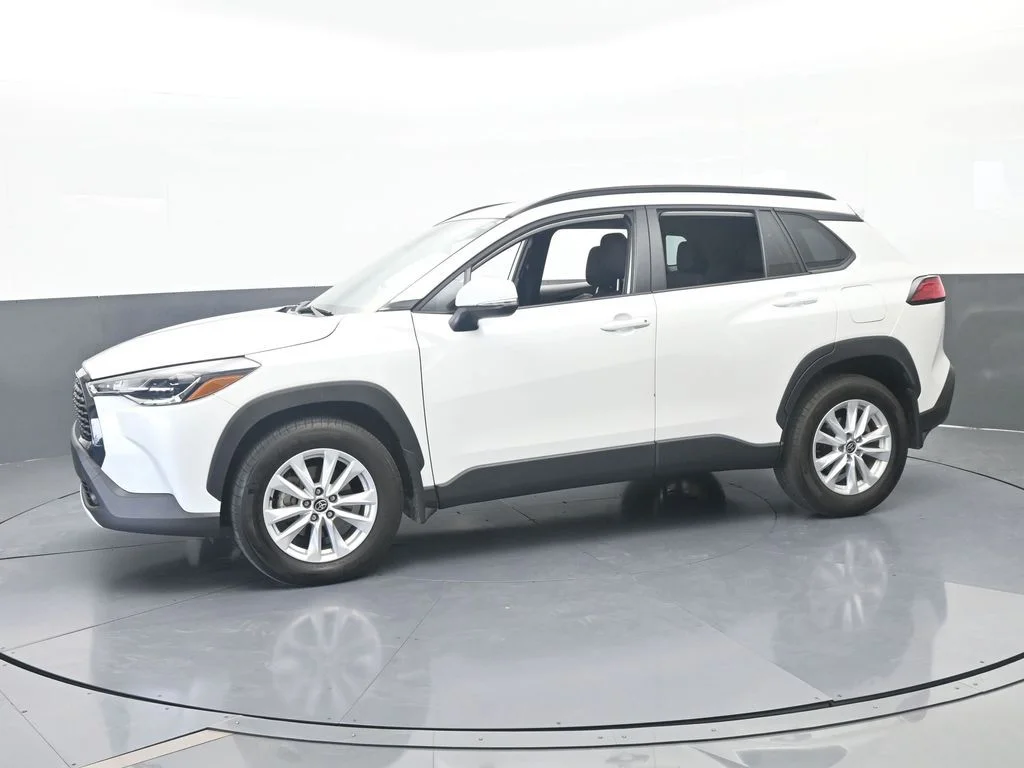 Used 2024 Pearl Toyota LE image 1