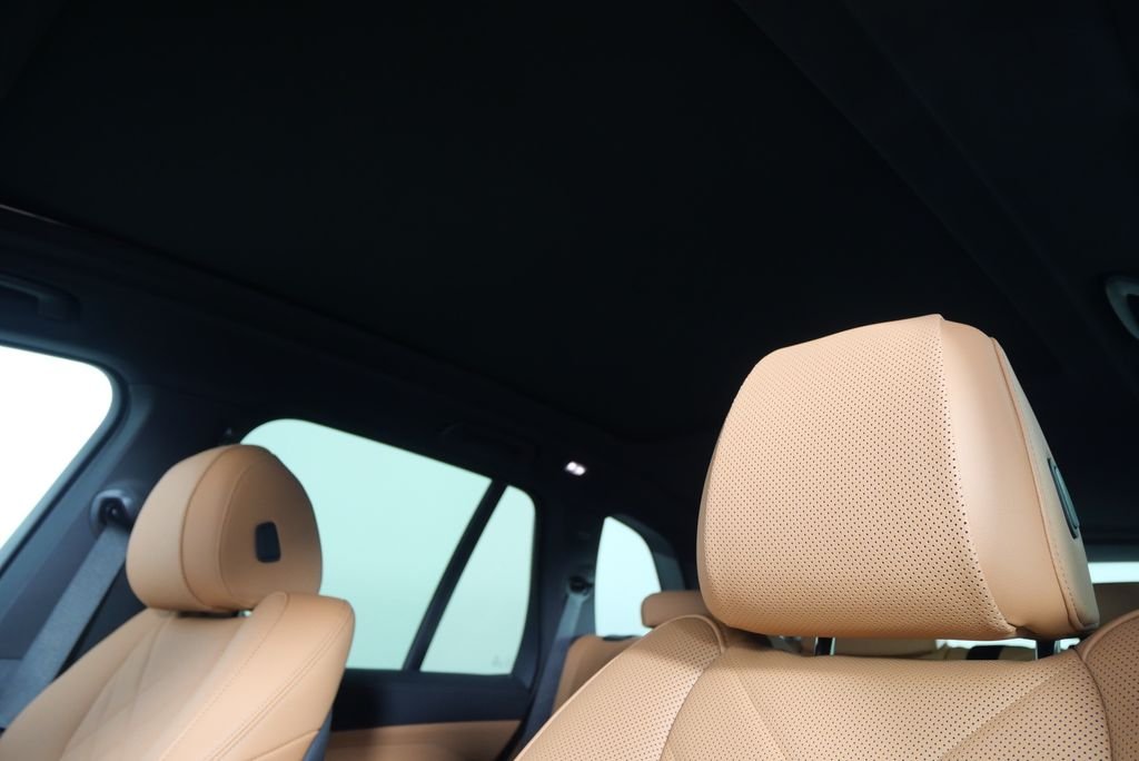 Used 2026 Mineral White Metallic BMW xDrive50e image 11