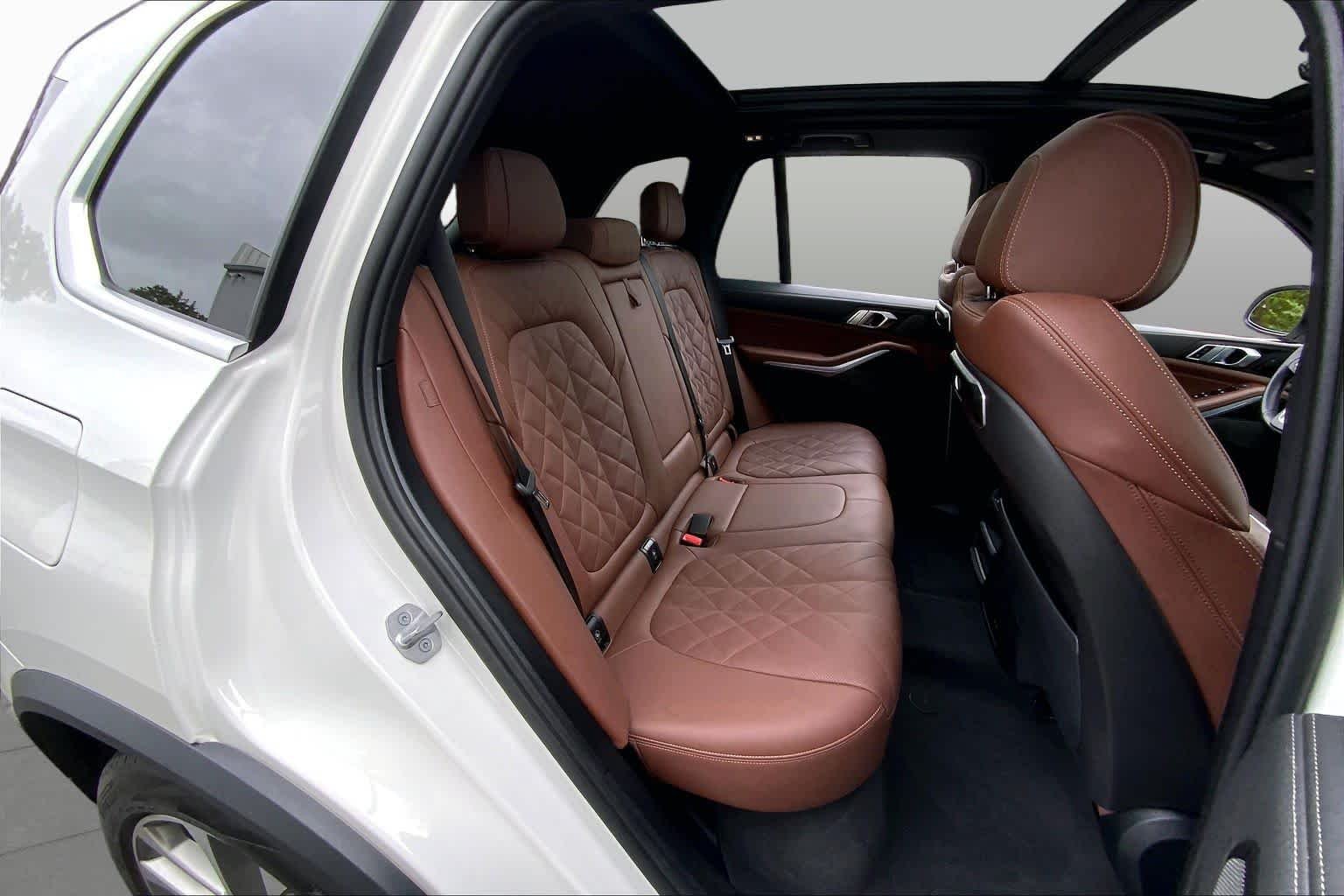 Used 2024 Mineral White Metallic BMW xDrive50e image 19
