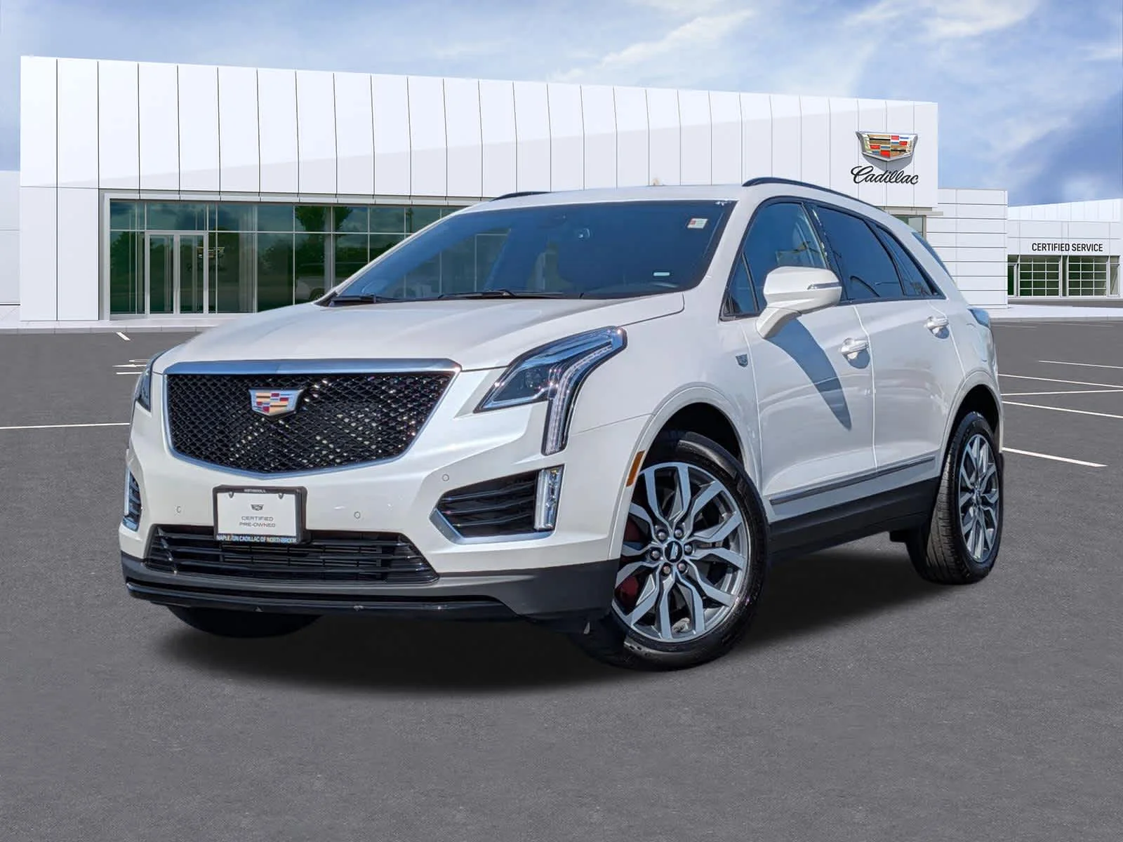 Certified Used 2023 Crystal White Tricoat Cadillac Sport image 1