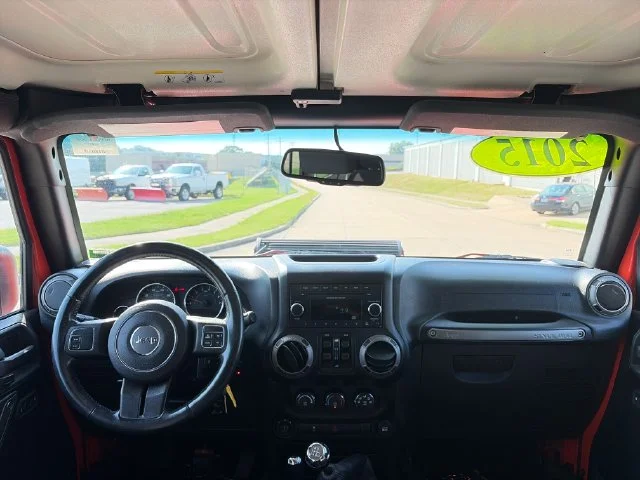 Used 2015 Orange Jeep Unlimited Sport image 24