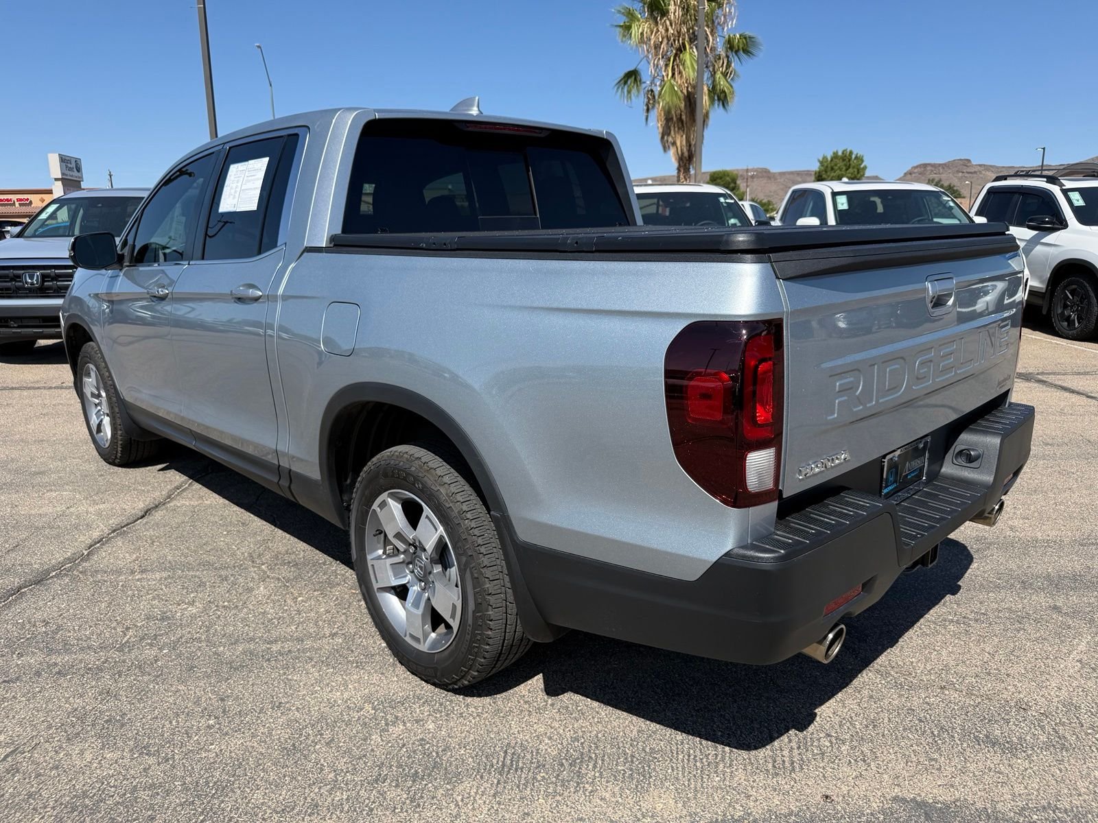 Certified Used 2025 Solar Silver Metallic Honda AWD RTL image 8