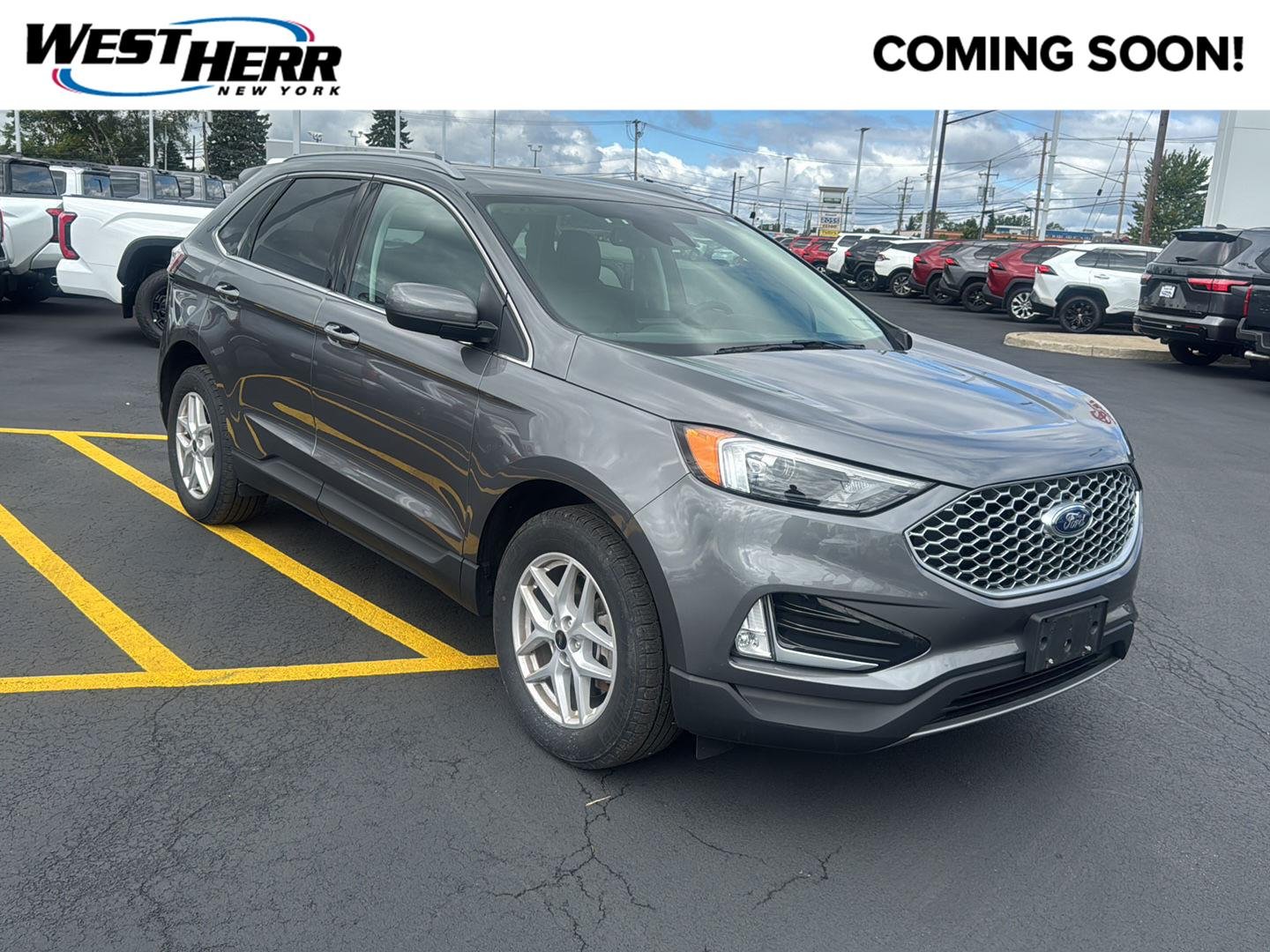 Used 2024 Carbonized Gray Ford SEL image 1