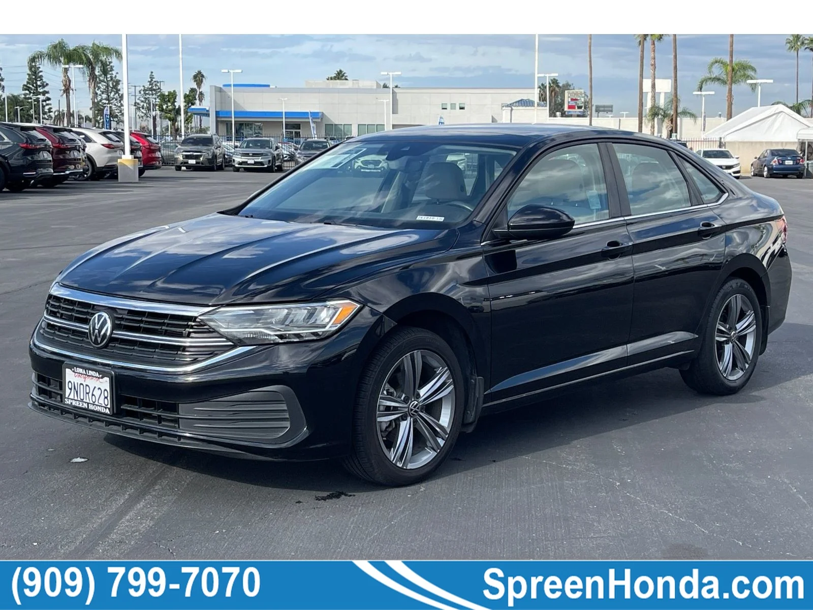 Used 2023 Deep Black Pearl Volkswagen SE image 1