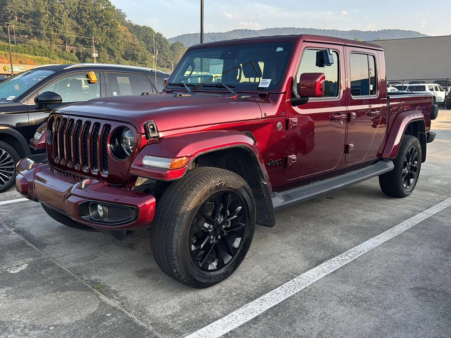 Used 2021 Snazzberry Pearlcoat Jeep High Altitude image 1