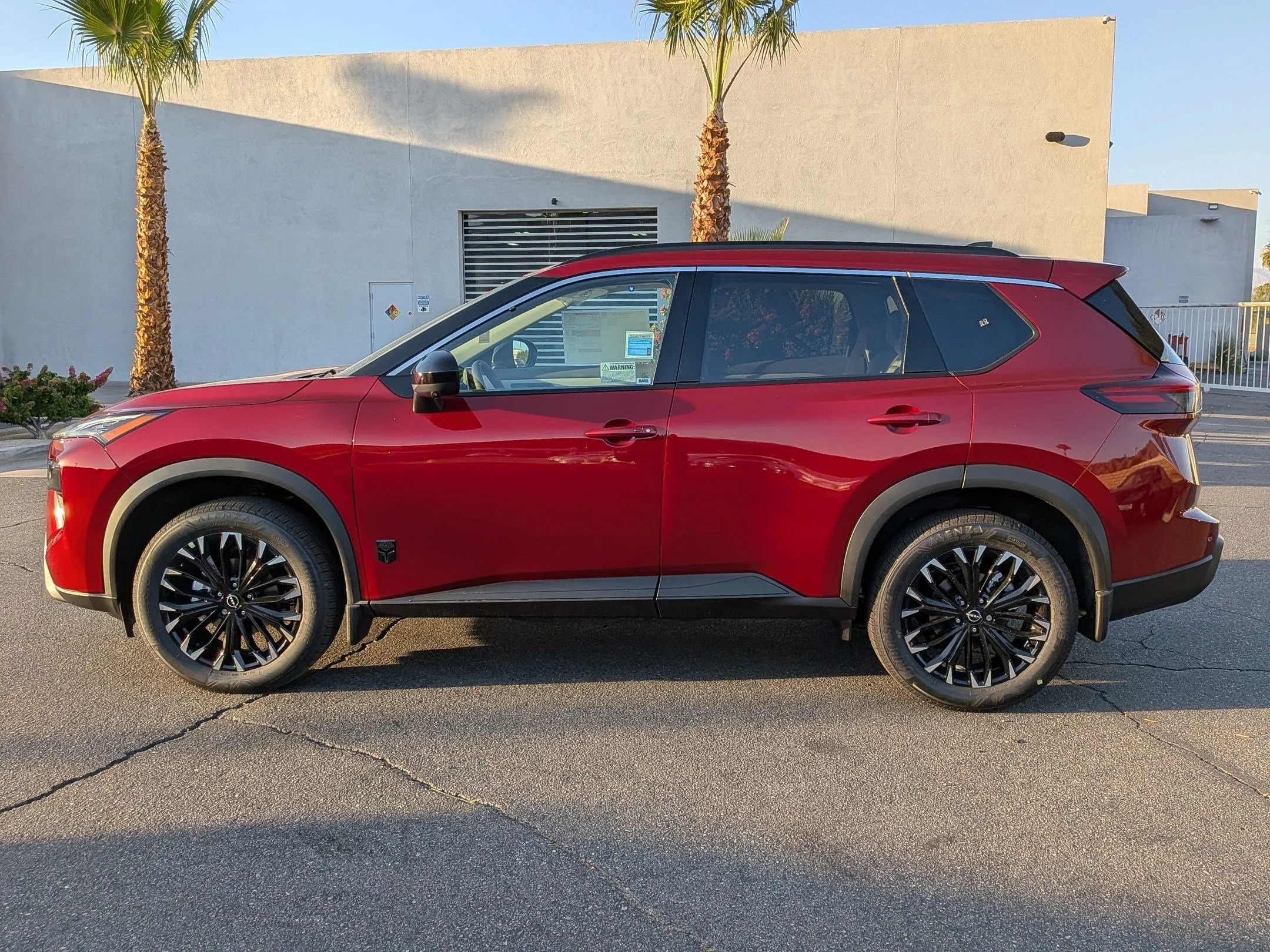 New 2026 Scarlet Ember Tintcoat Nissan Dark Armor image 3