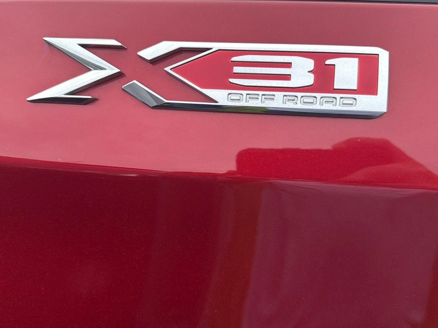 Used 2024 Volcanic Red Tintcoat GMC SLT image 2