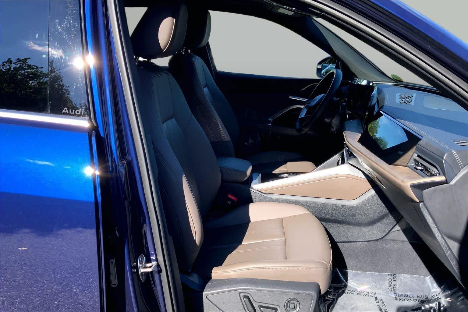 Used 2025 Navarra Blue Metallic Audi Premium image 9