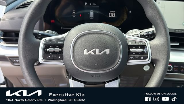 New 2026 Snow White Pearl Kia LX image 11