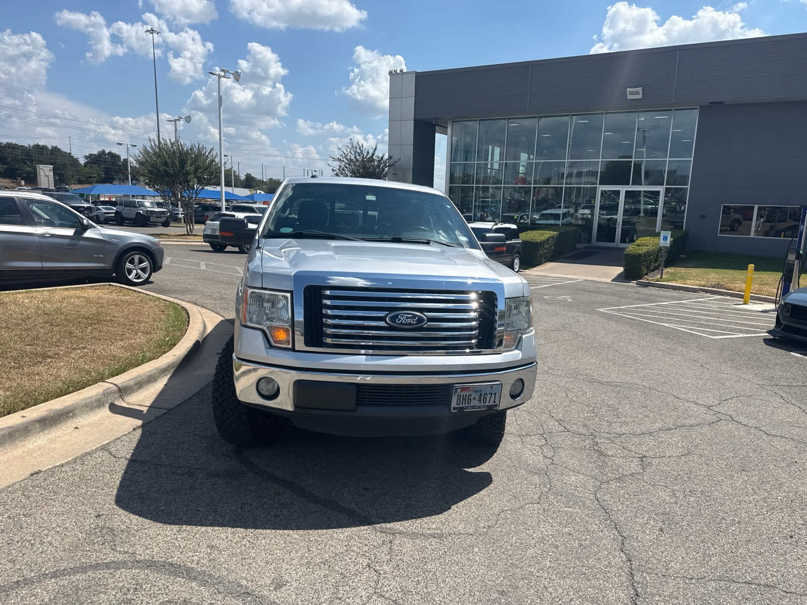 Used 2011 Ingot Silver Metallic Ford XLT image 4