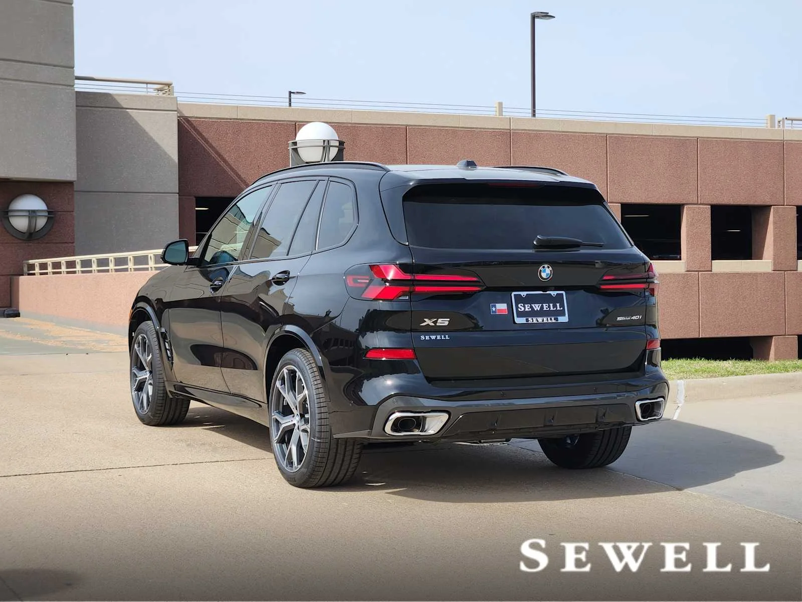 New 2026 Black Sapphire Metallic BMW sDrive40i image 3