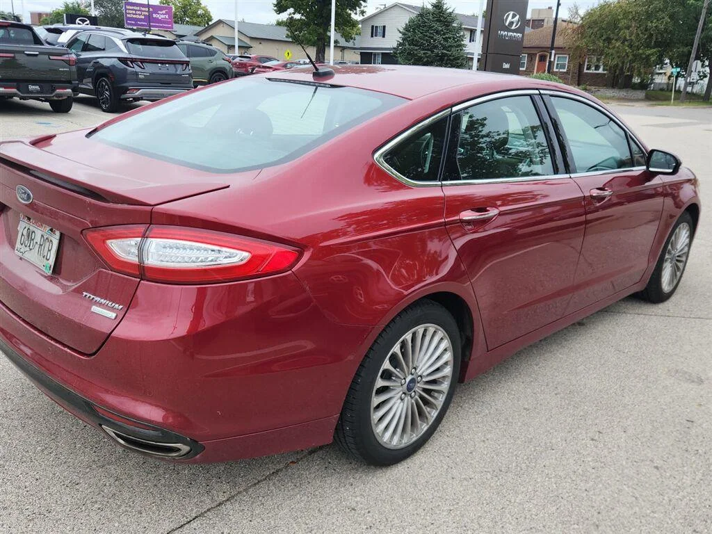 Used 2016 Ruby Red Metallic Tinted Clearcoat Ford Titanium image 4