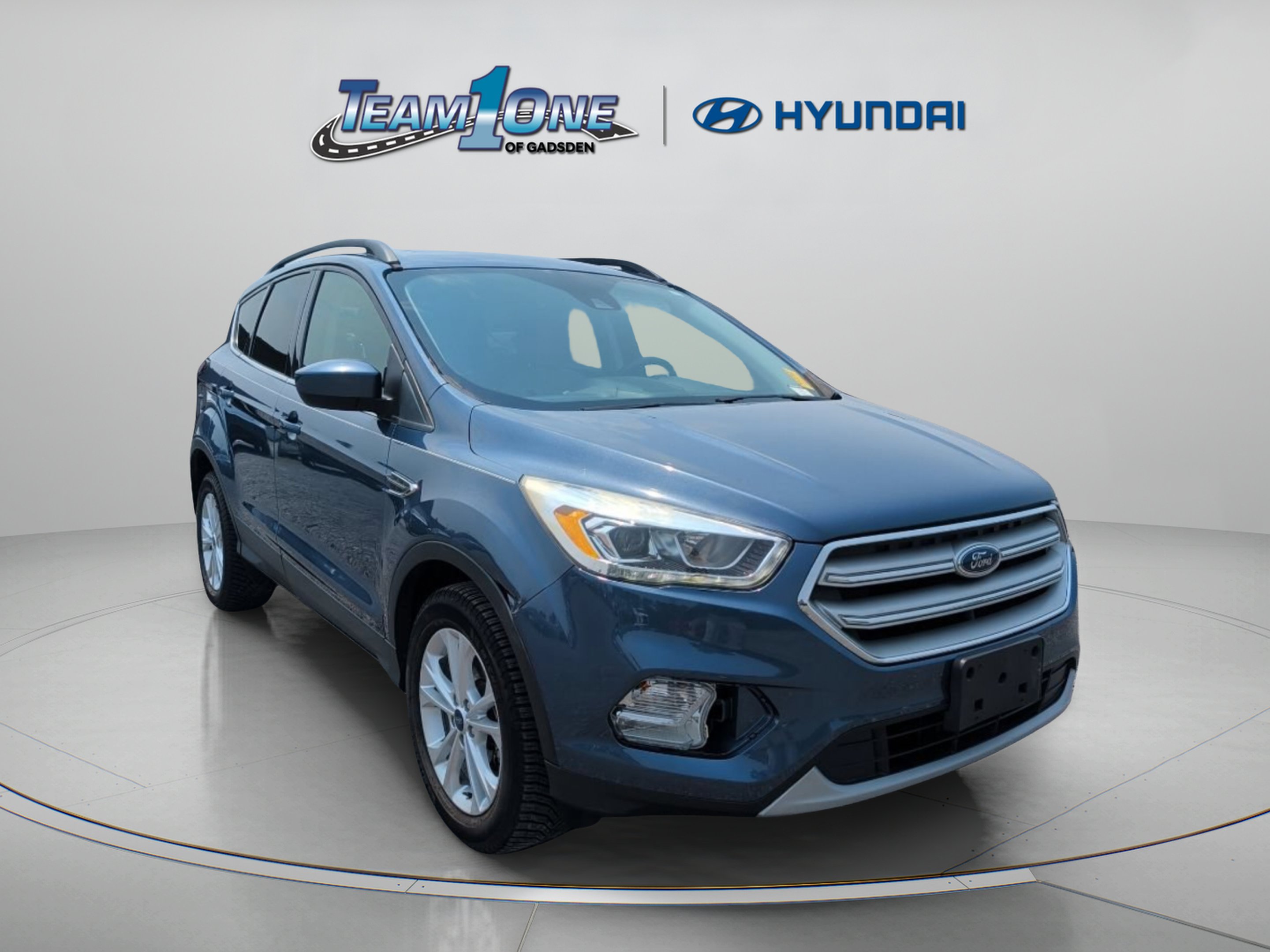 Used 2018 Blue Metallic Ford SEL image 1